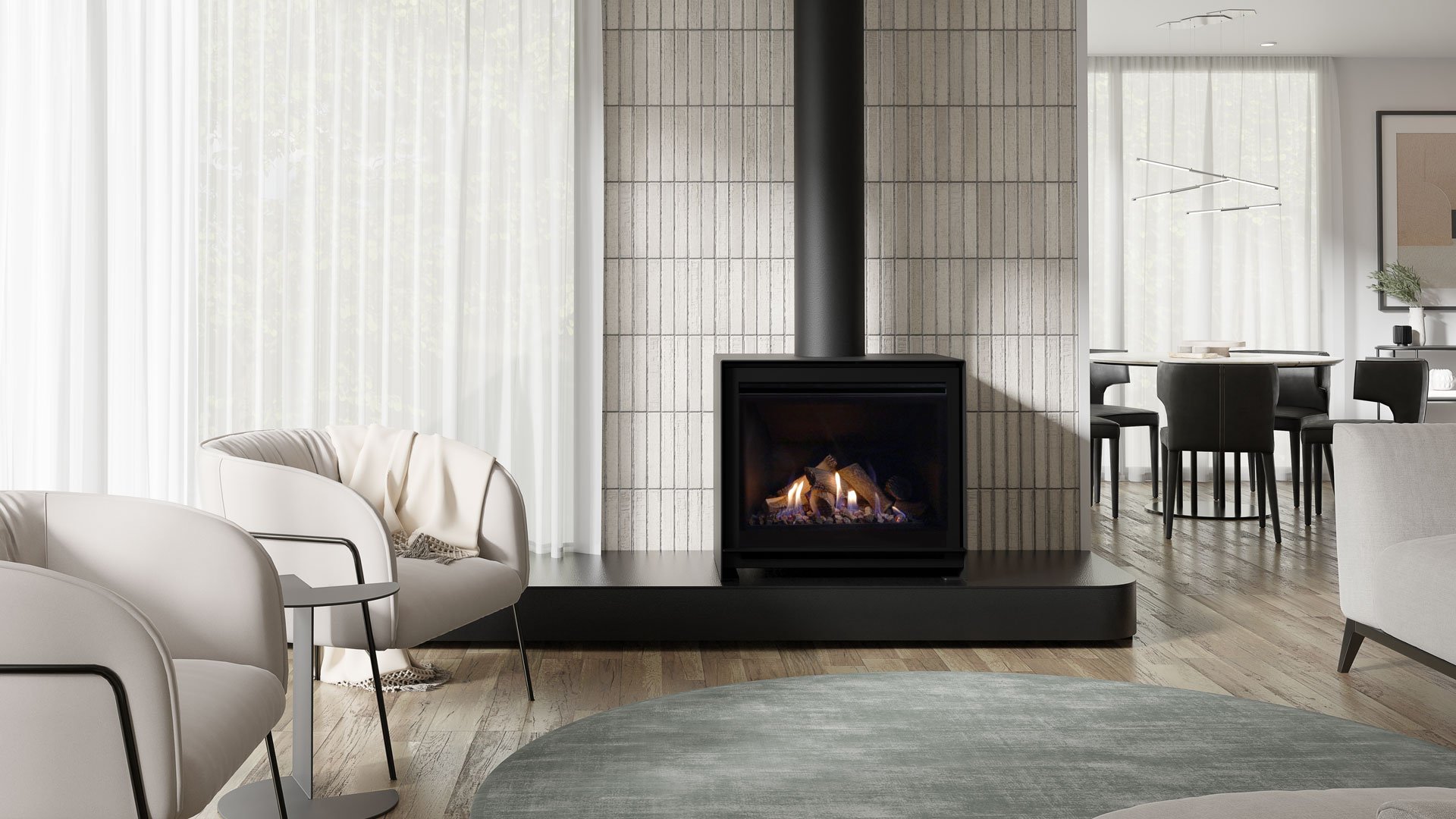 Escea DFS740 freestanding gas fireplace in a living room at dusk